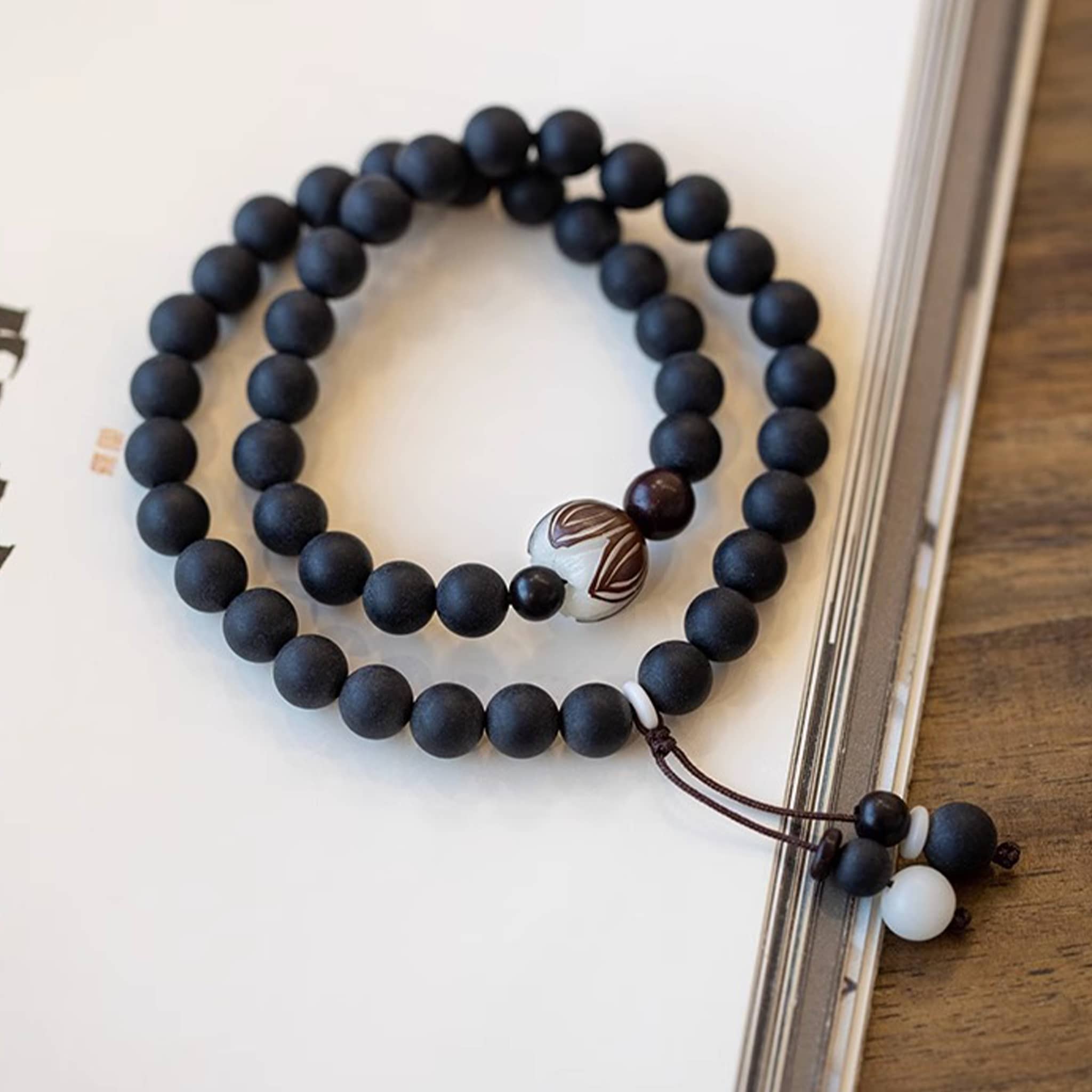 Black amber double wrap bracelet with smooth beads for a calming accessory