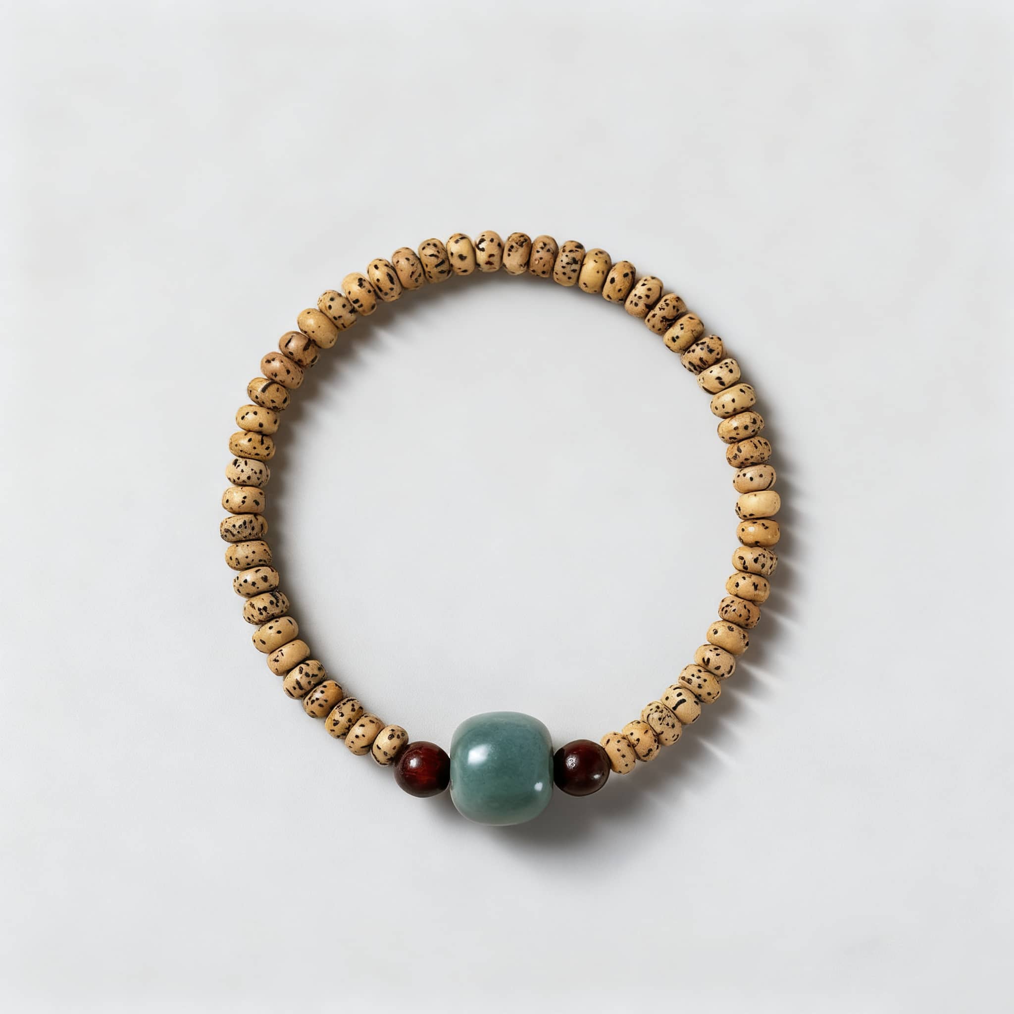 5 Senses bodhi seed meditation bracelet featuring calming natural beads and a decorative centerpiece
