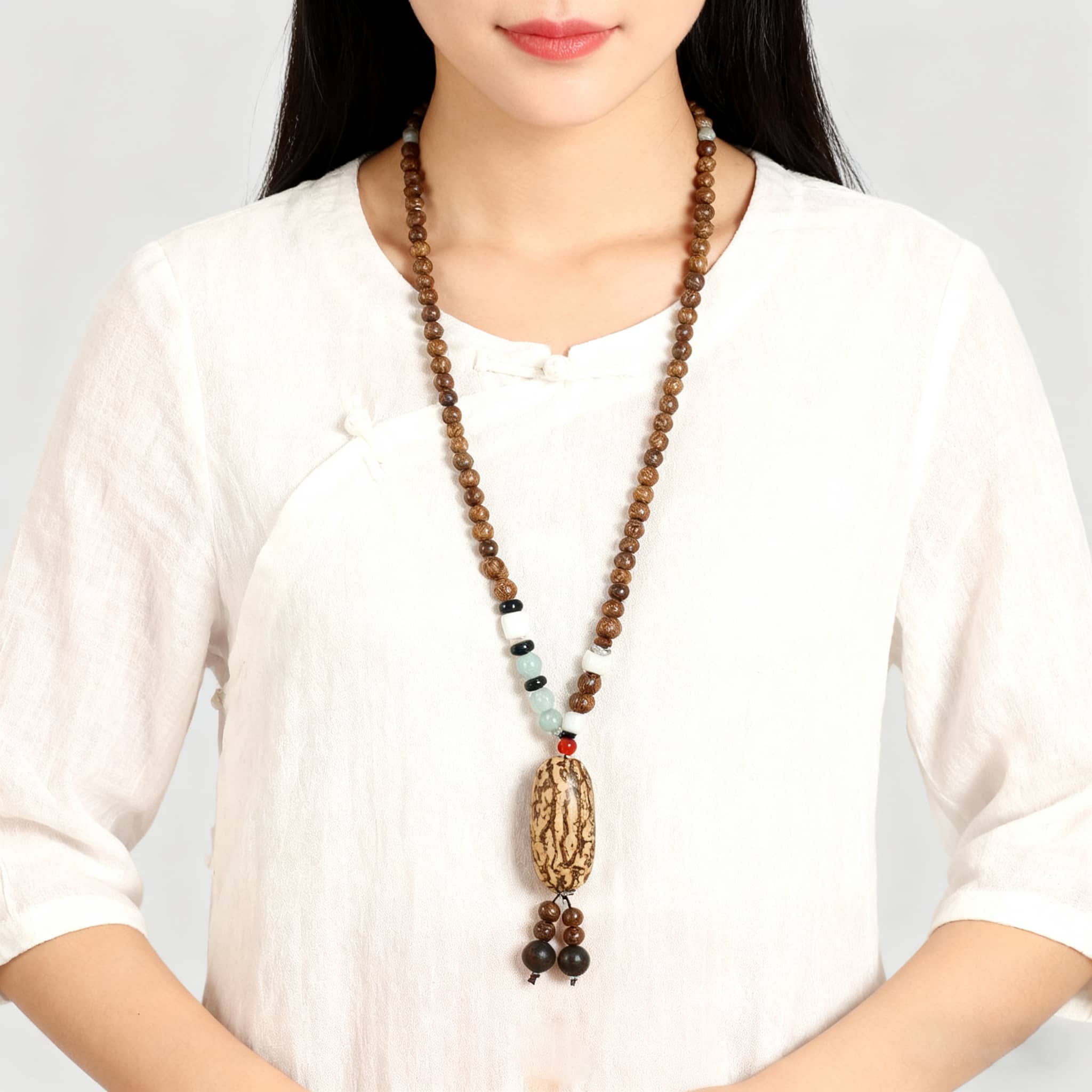 Angry bodhi seed wood bead necklace with natural wooden beads and decorative elements