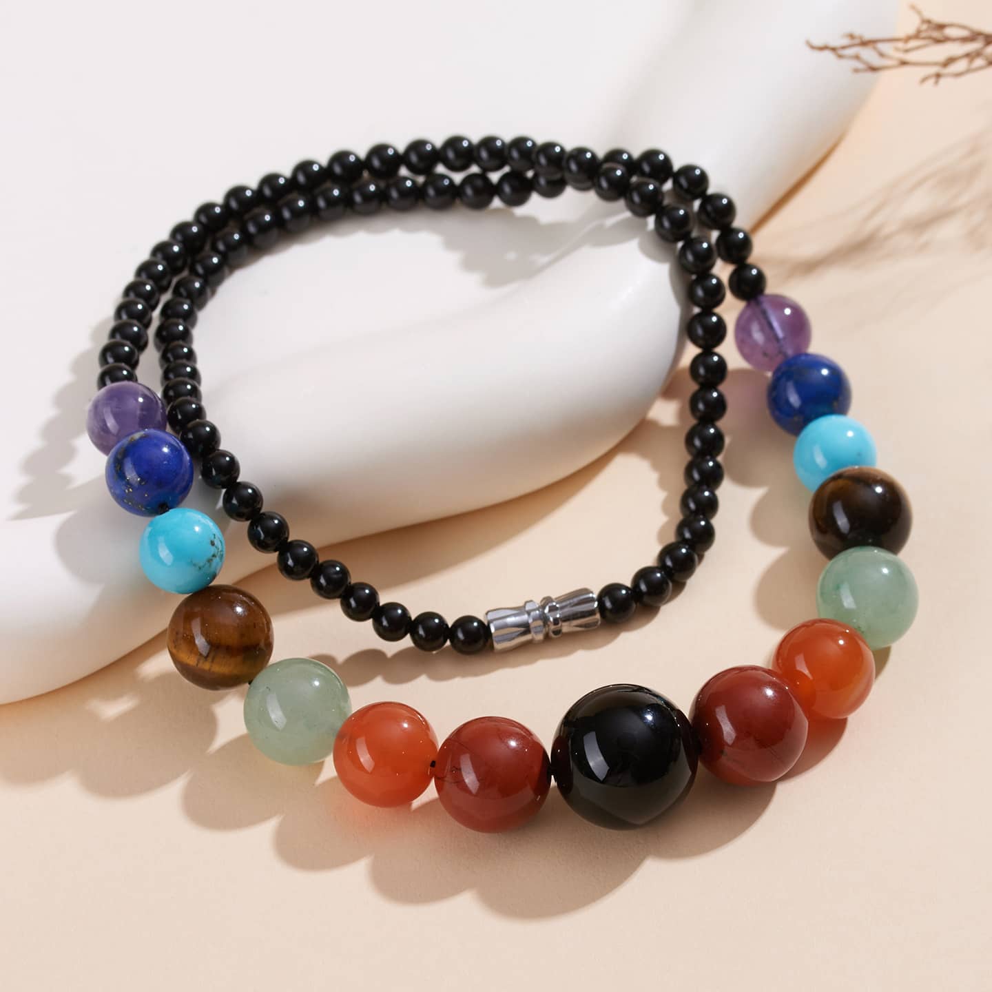 5 Senses crystal necklace for stress and self care featuring colorful healing stones and black beads