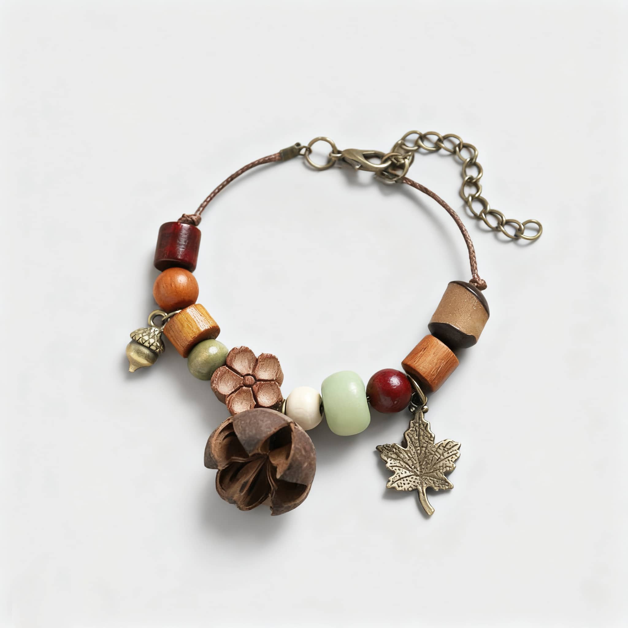 Handcrafted berry and wood bracelet featuring colorful beads and a stylish leaf charm