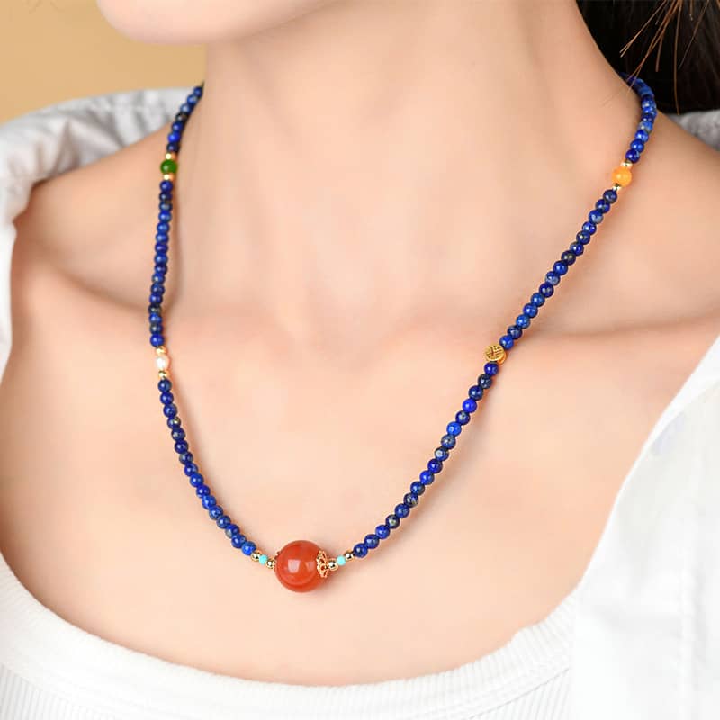 Lapis lazuli and red agate jewelry necklace featuring a vibrant design with colorful beads