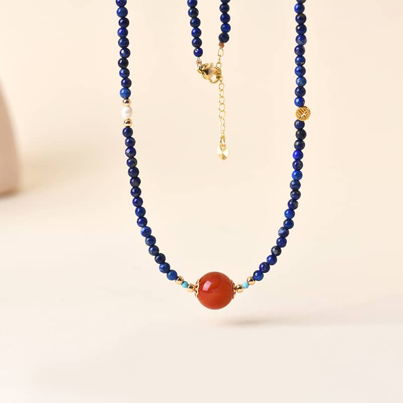 Anxious necklace featuring lapis lazuli and red agate jewelry with gold accents for a stylish look