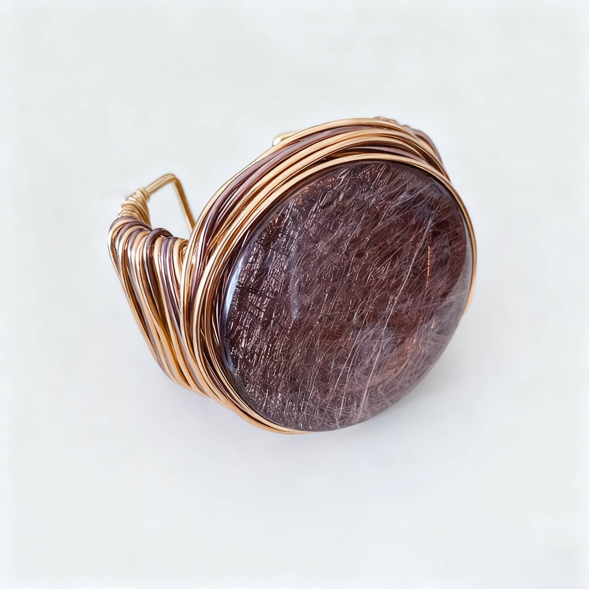 Angry mindful resin cuff bracelet with a large round stone wrapped in gold wire for a stylish look