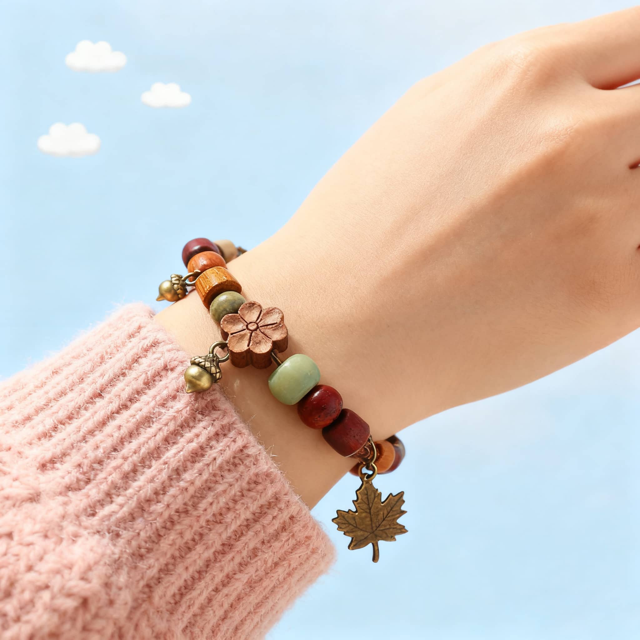 Colorful red berry wood bead bracelet with floral accents, perfect for casual wear and unique style
