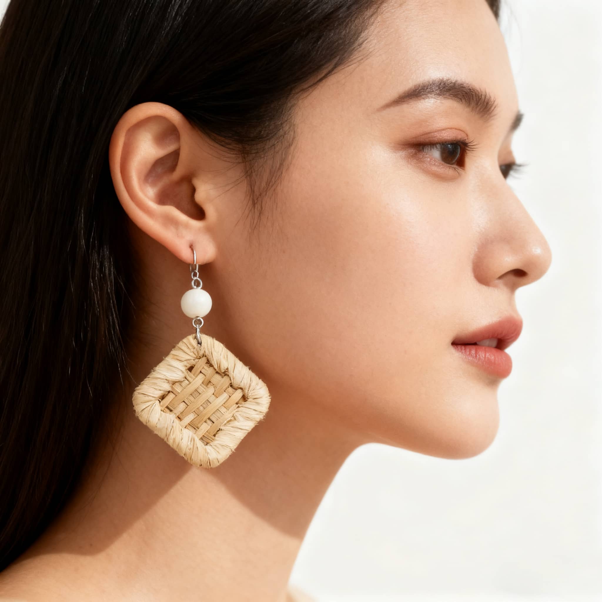 Elegant square rattan earrings for women, featuring a woven design and bead accents