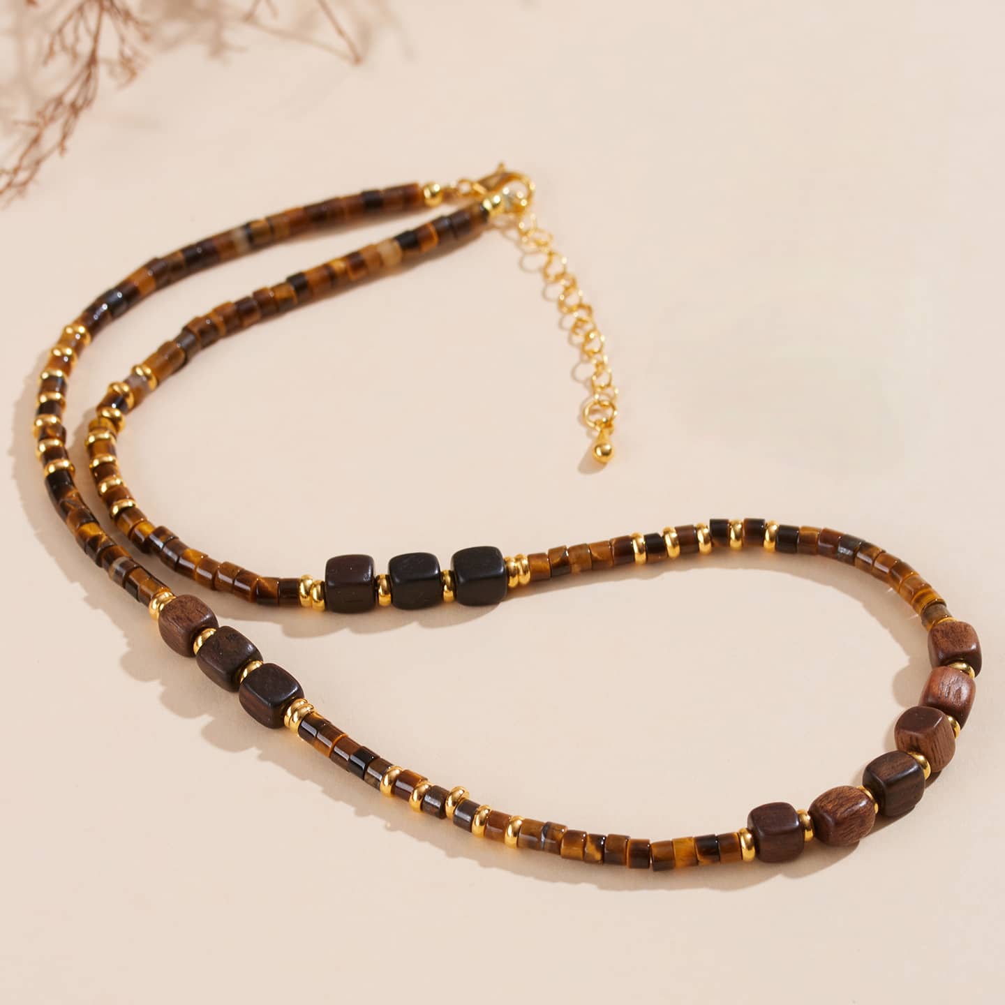 Stylish tiger's eye anxiety necklace with gold accents, perfect for calming and grounding energy