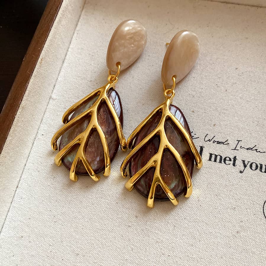 Vintage metal cage statement earrings in gold with brown decorative accents