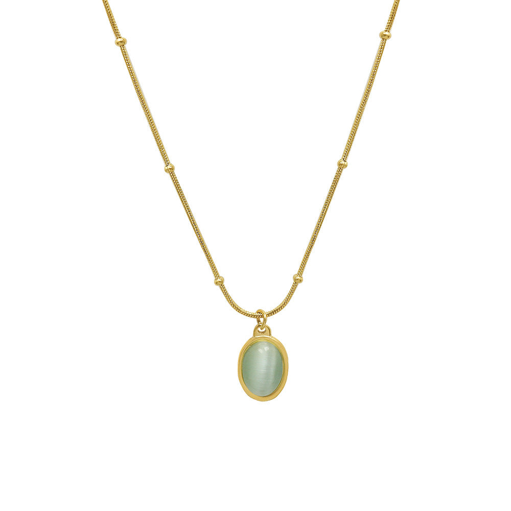 Elegant 18K gold green cat's eye necklace with oval pendant and delicate chain design