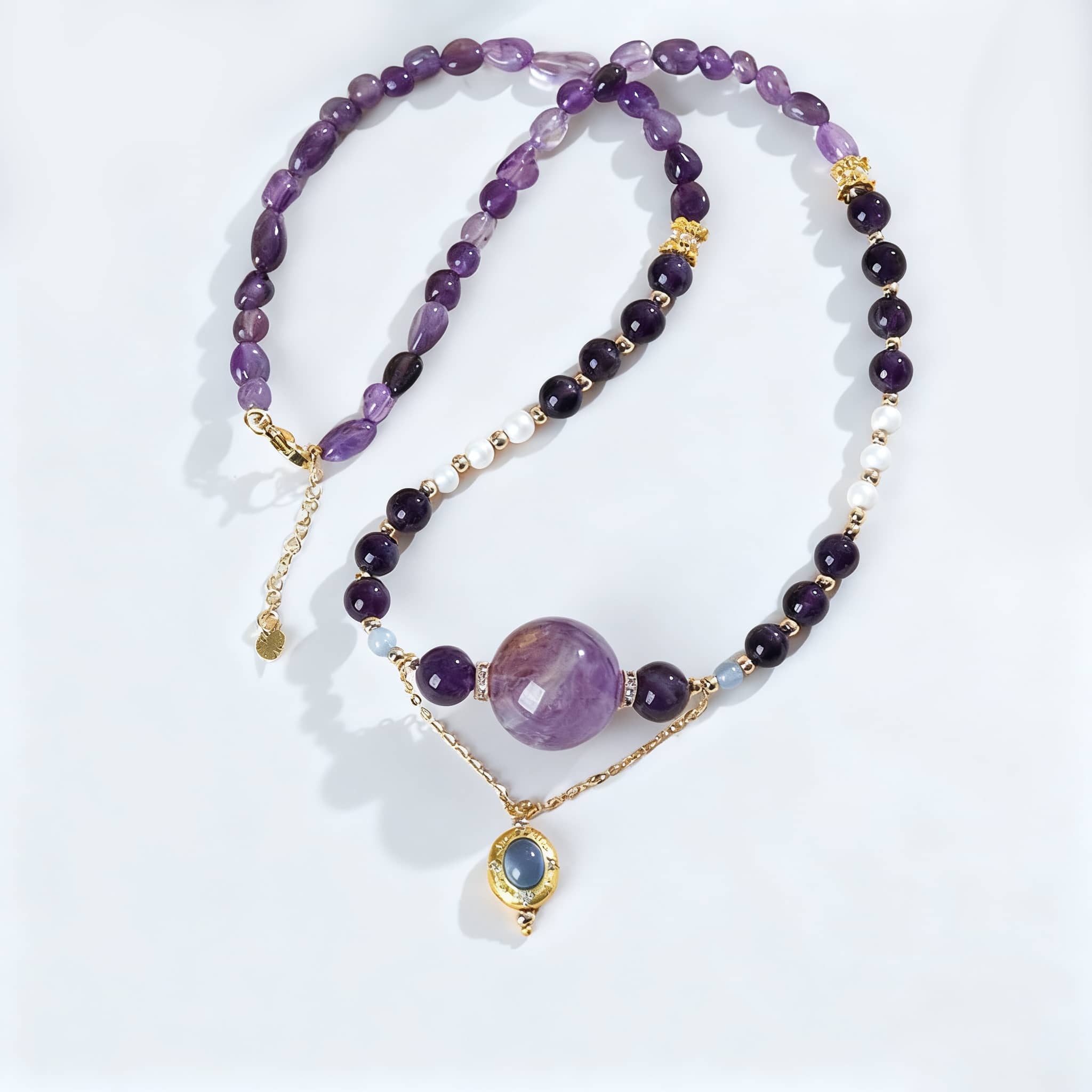 Anxious necklace featuring amethyst pearl aquamarine jewelry with gold accents for a calming touch