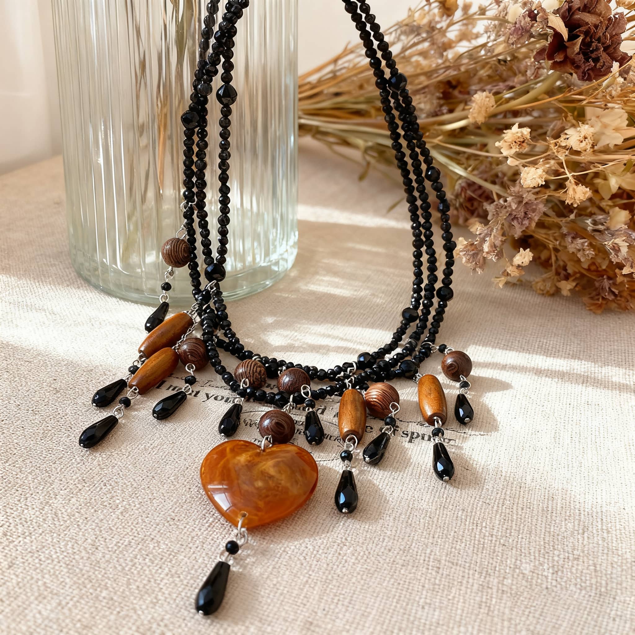 Angry heart resin necklace in a unique design with black and brown beads for stylish accessories