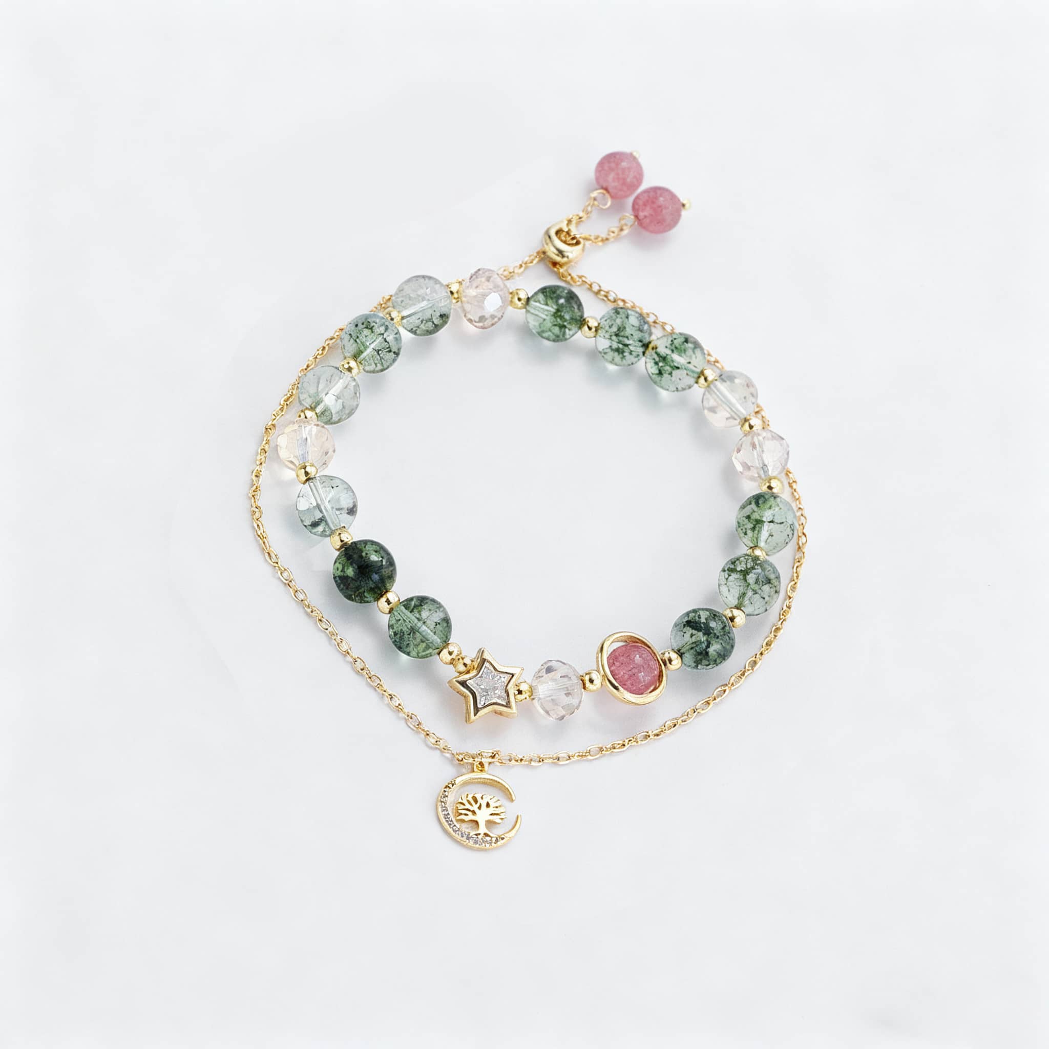 Anxiety relief crystal bracelet with multi-colored beads and gold charms from 5 Senses