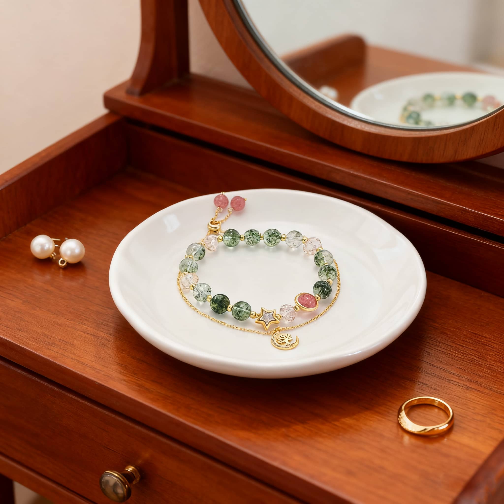 Anxiety relief crystal bracelet displayed on a white plate, featuring natural stones and gold accents