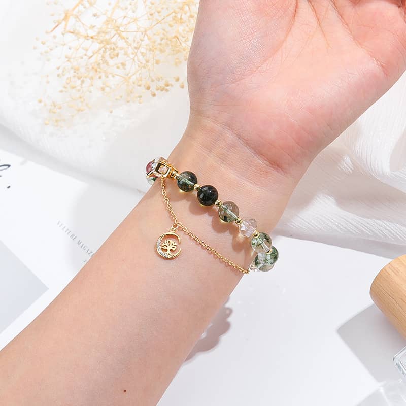 Anxiety relief crystal bracelet with green stones and gold accents for calming and stylish wear
