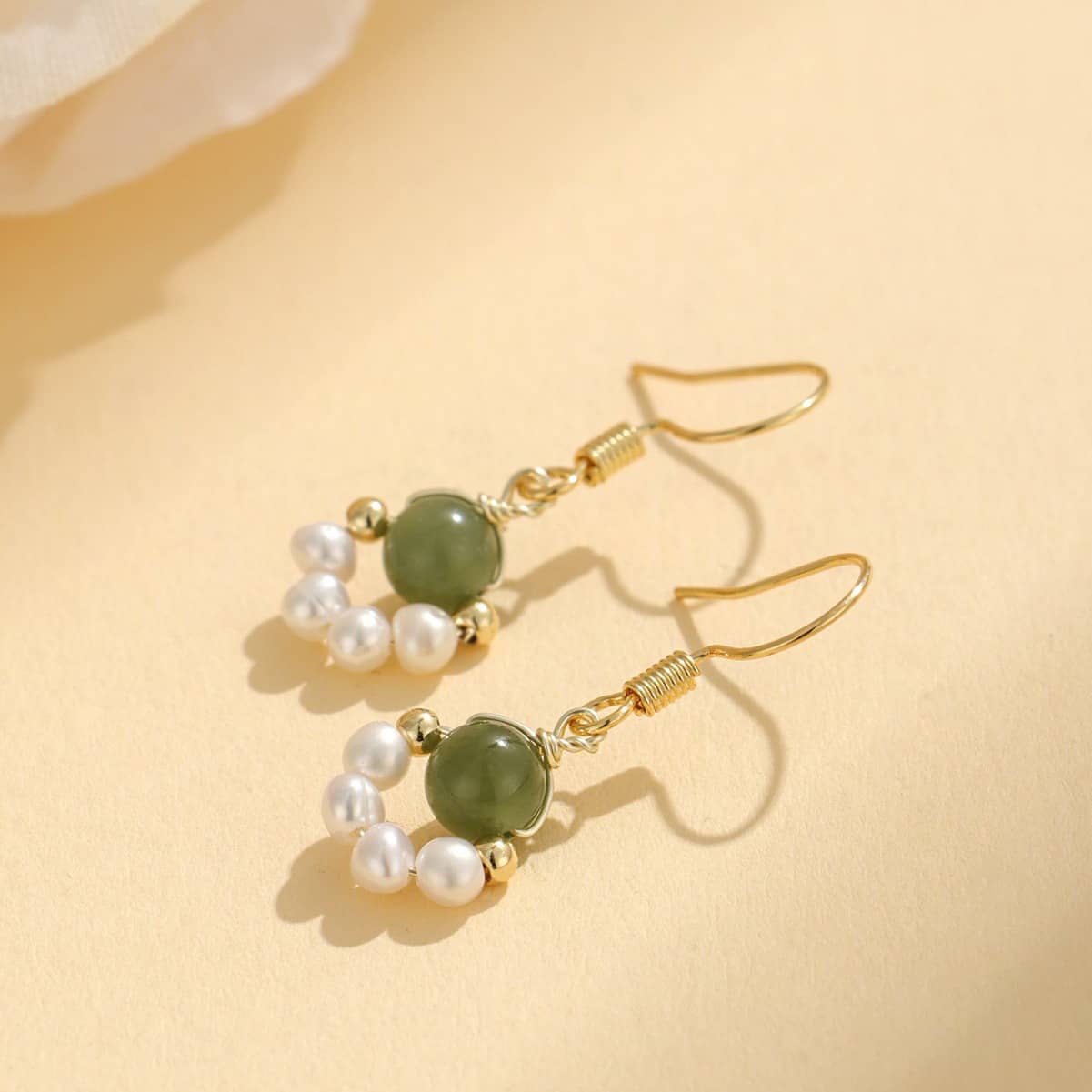 Elegant anxiety relief jade pearl earrings featuring jade and white pearls for a calming accessory