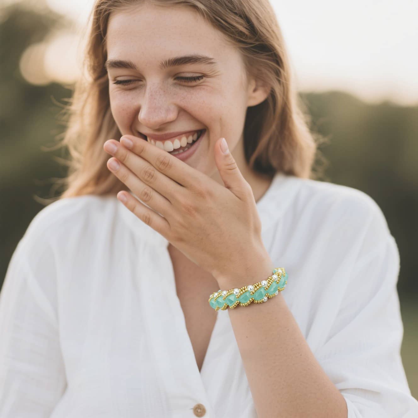 Joy Aqua Glass and Pearl Bracelet from 5 Senses, perfect for adding a pop of color to any outfit