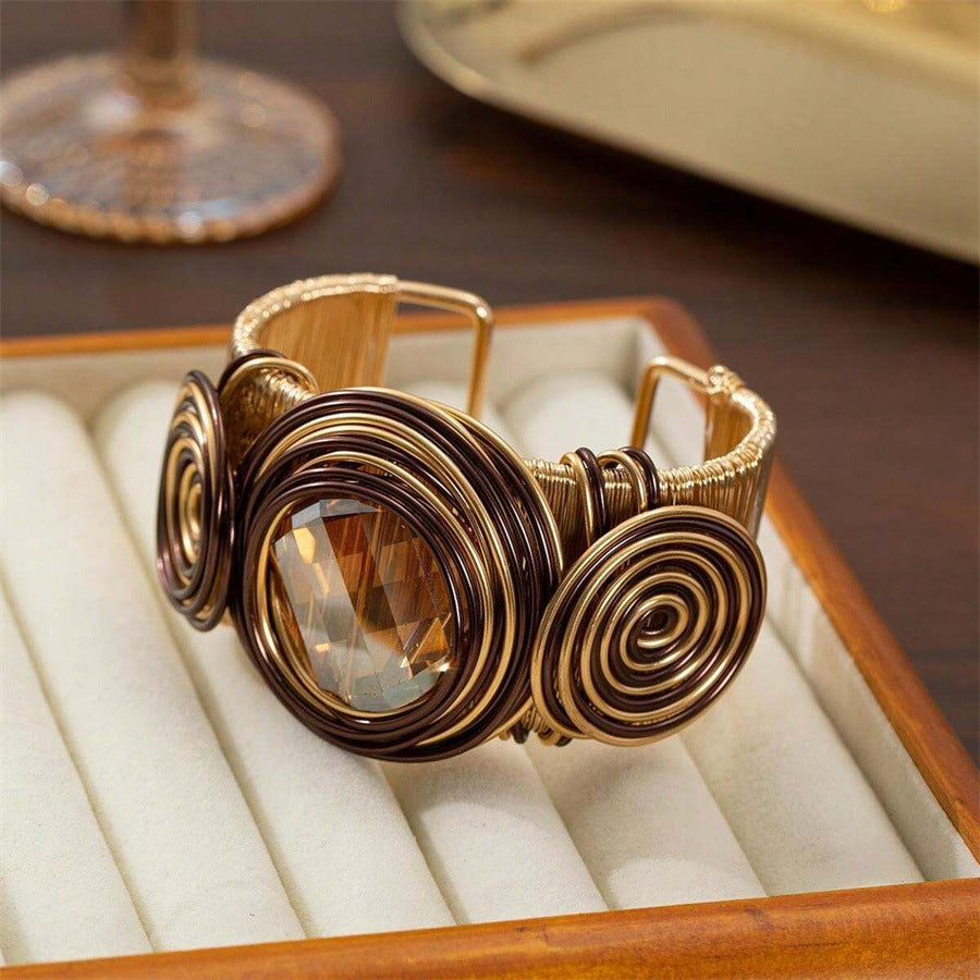 Handcrafted wire wrapped gold cuff with large faceted gemstone and spiral accents bold gemstone cuff bracelet
