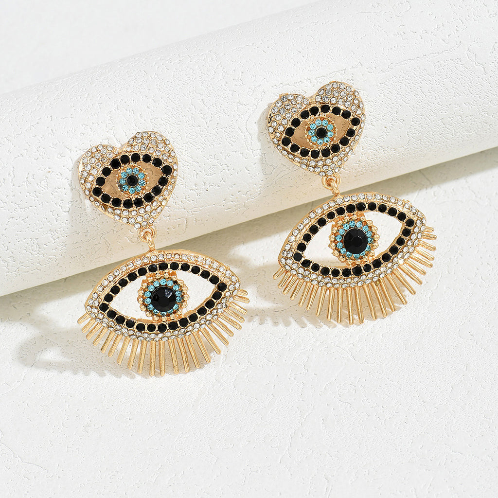 Gold heart angel eye stud earrings with black white and turquoise crystals and fringe drop design