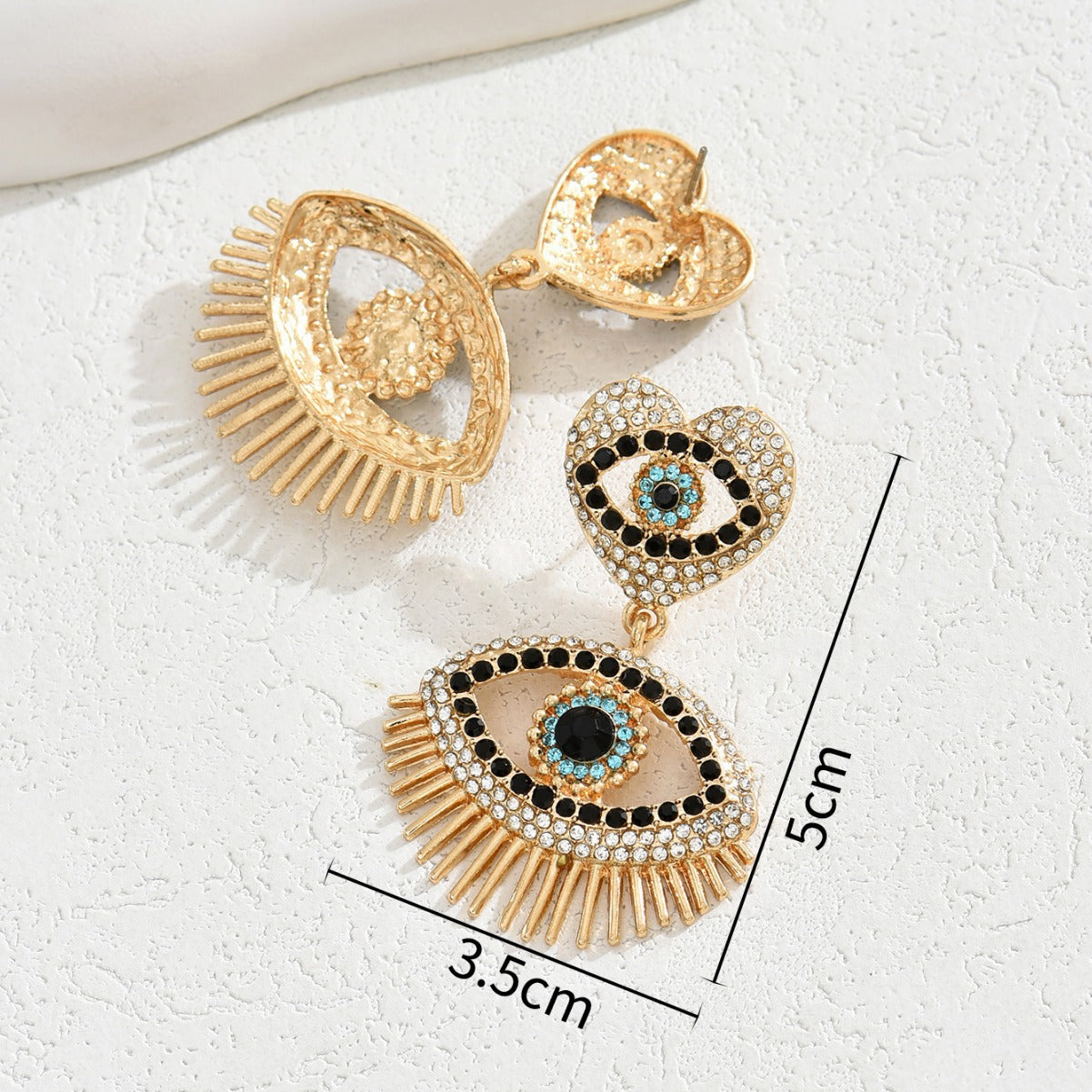 Gold tone heart angel eye stud earrings with crystal pave blue center and fringe 5 cm drop