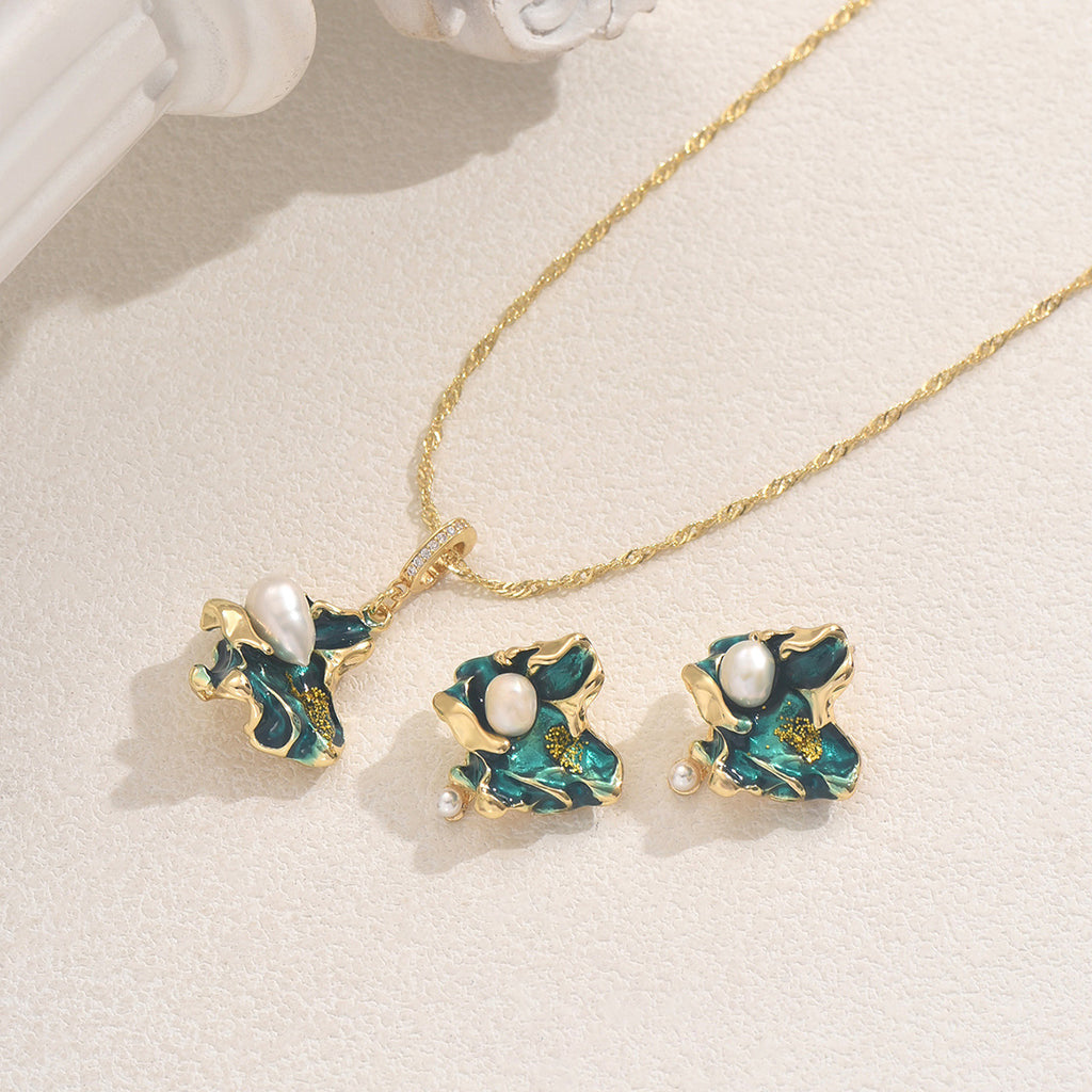 Gold and green enamel lake shaped pearl jewelry set with white freshwater pearls and twisted gold chain