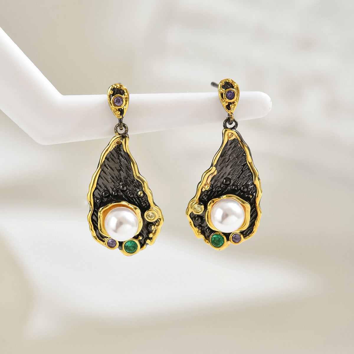 Vintage gold and black teardrop earrings with central pearl and colorful accents zircon statement earrings