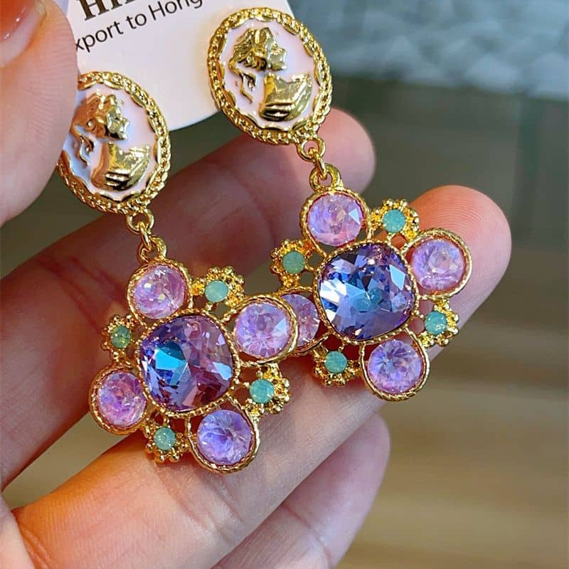 Baroque cameo floral earrings with colorful gemstones and intricate gold detailing