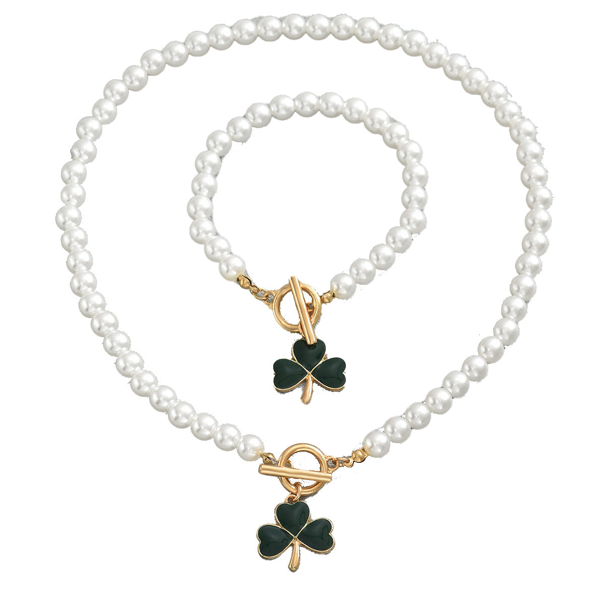 heart and clover pearl jewelry set featuring gold toggle clasps and green enamel clover charms on necklace and bracelet
