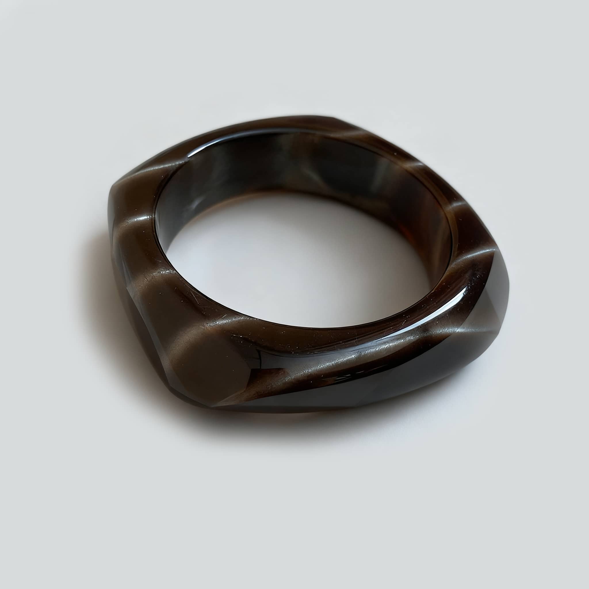 Stylish black cat eye resin bracelet with a unique geometric design for trendy accessories