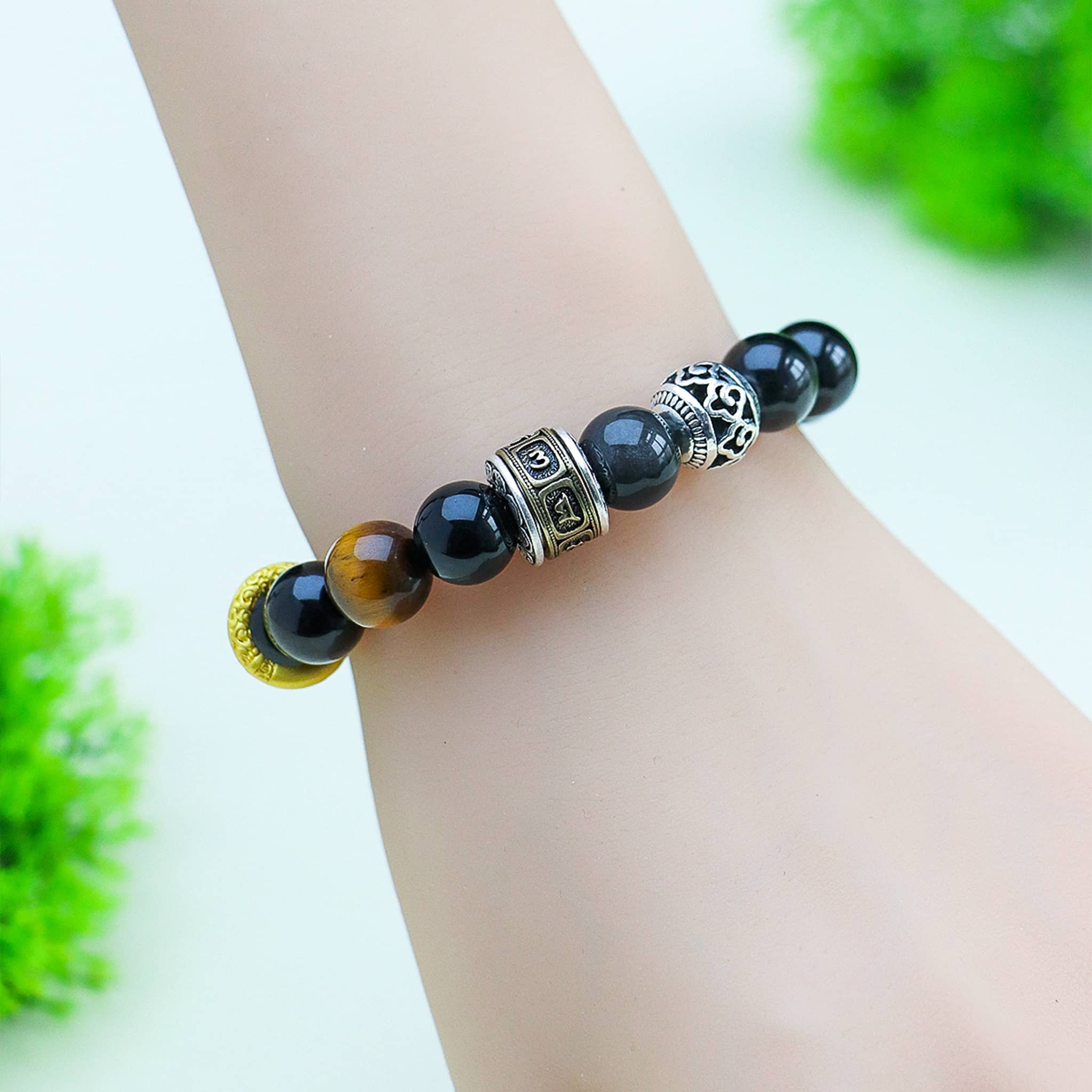 Black Obsidian anxiety bracelet with decorative silver beads and tiger's eye accents for stress relief