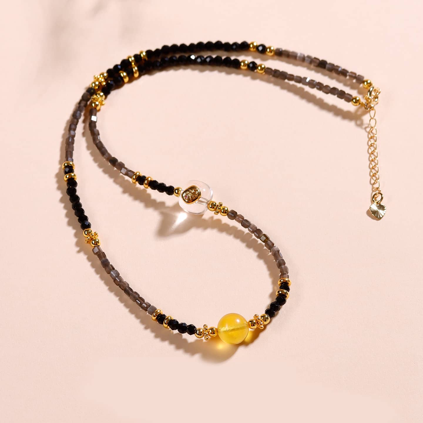 5 Senses black obsidian spinel anxiety choker with yellow gemstone and gold accents
