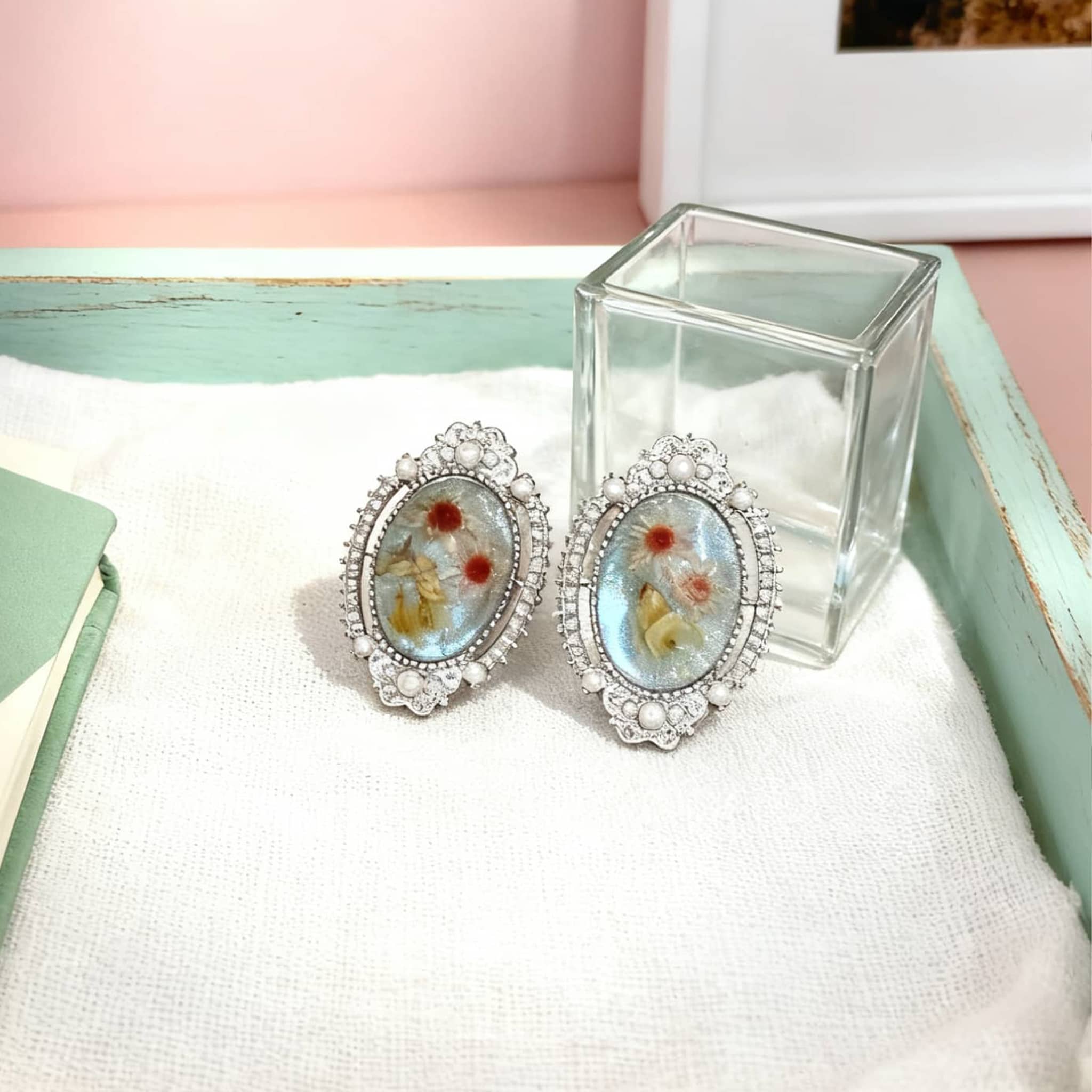 Elegant blue amber earrings for women featuring floral details with a vintage silver setting
