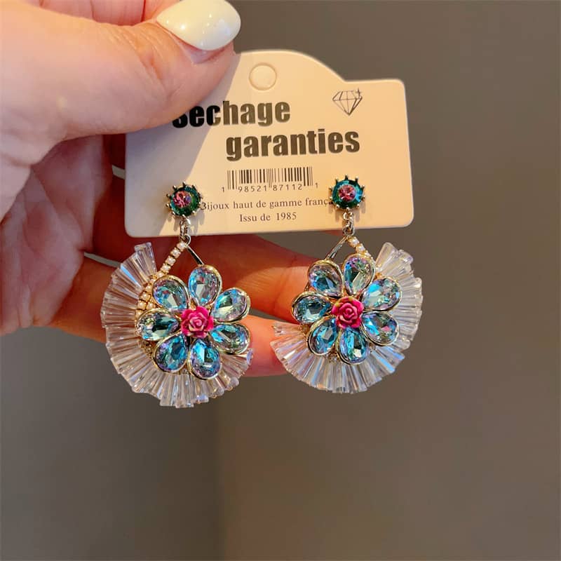 Stunning blue crystal flower earrings with colorful accents and delicate design for elegant style