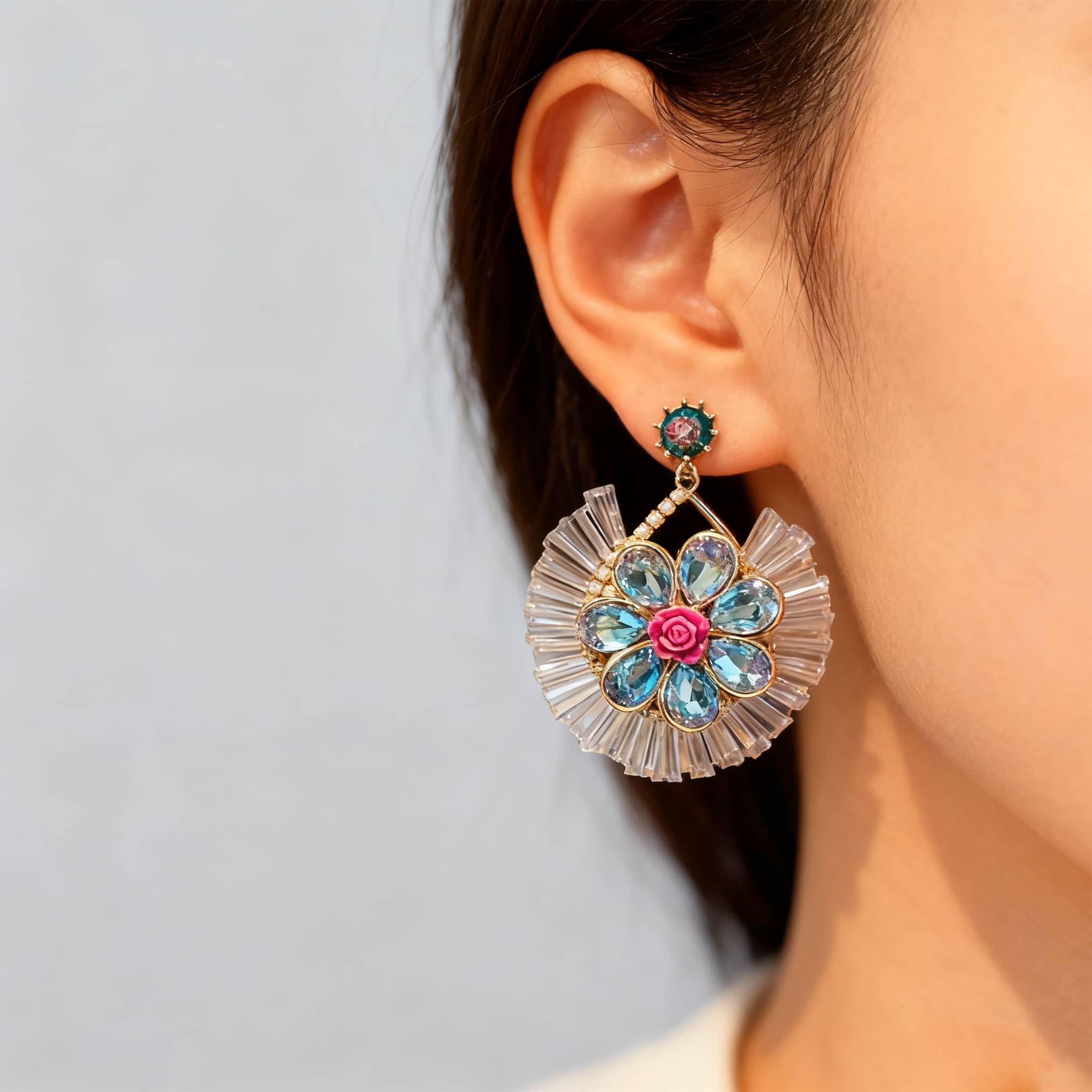 Elegant blue crystal flower earrings by 5 Senses featuring vibrant floral design and delicate detailing