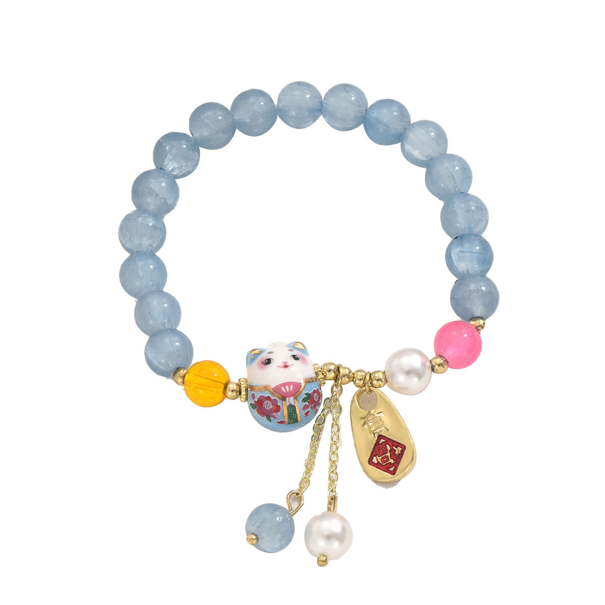 Calm bracelet featuring blue crystal beads with cat charm and gold accents blue crystal luck bracelet