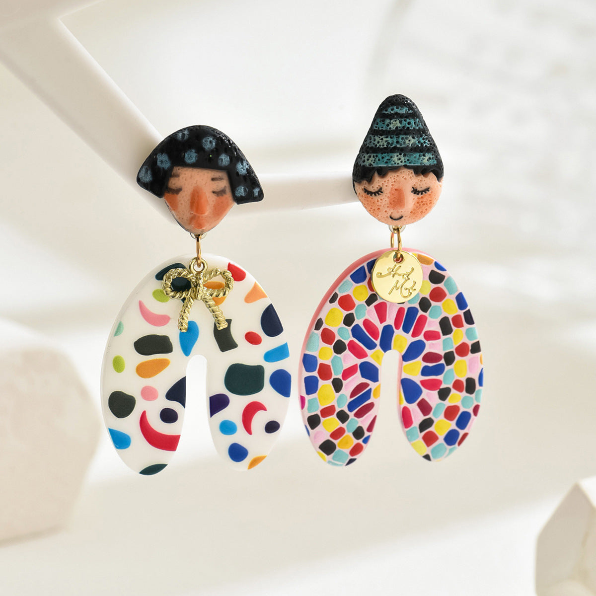 Handmade colorful Indian doll earrings with painted clay faces and multicolor mosaic drop and gold charm