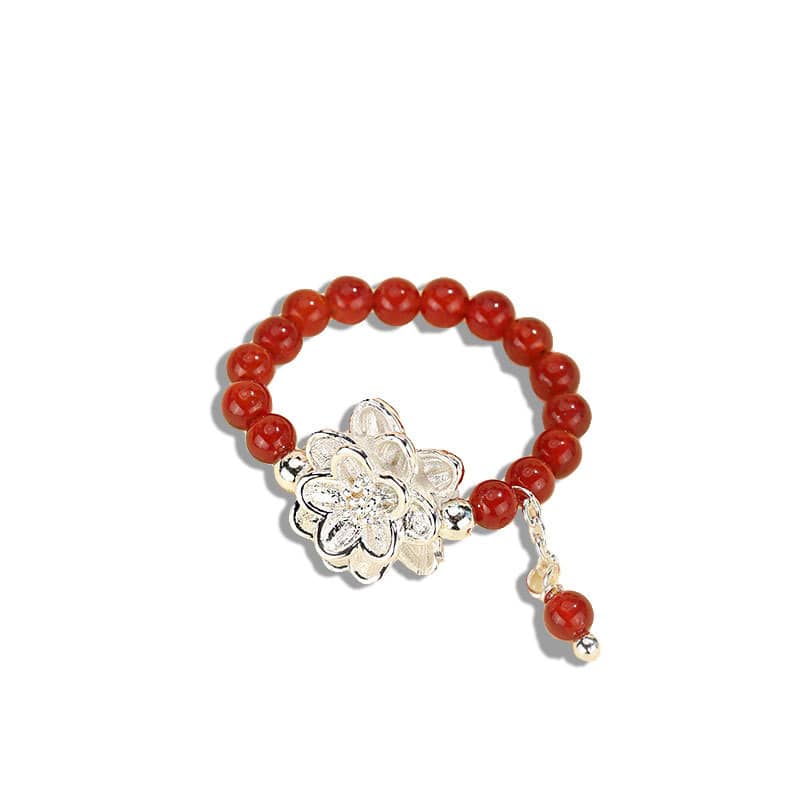 5 Senses Carnelian anxiety relief ring with a floral design and beaded band for calming effects