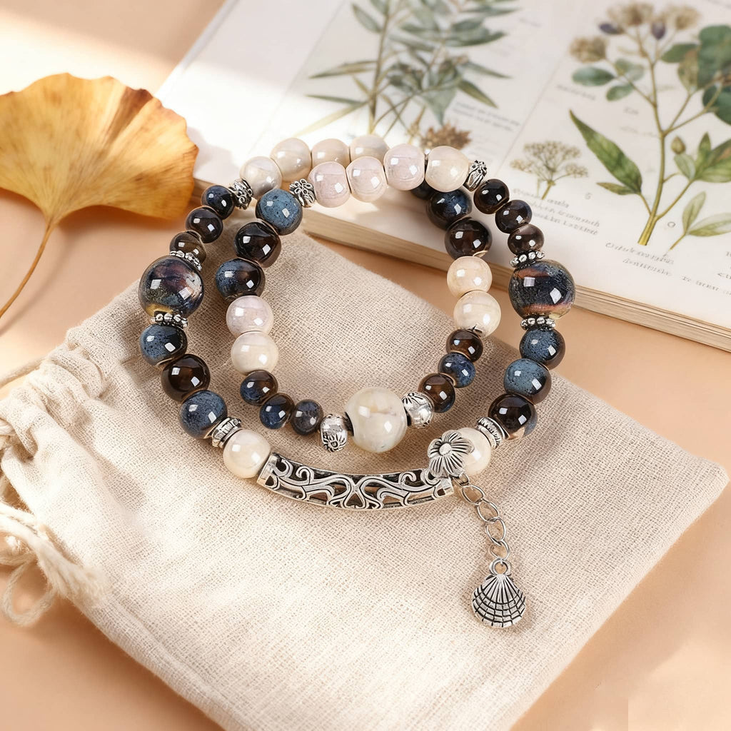 Colorful ceramic and shell bracelet for self-care featuring a mix of gemstones and decorative beads