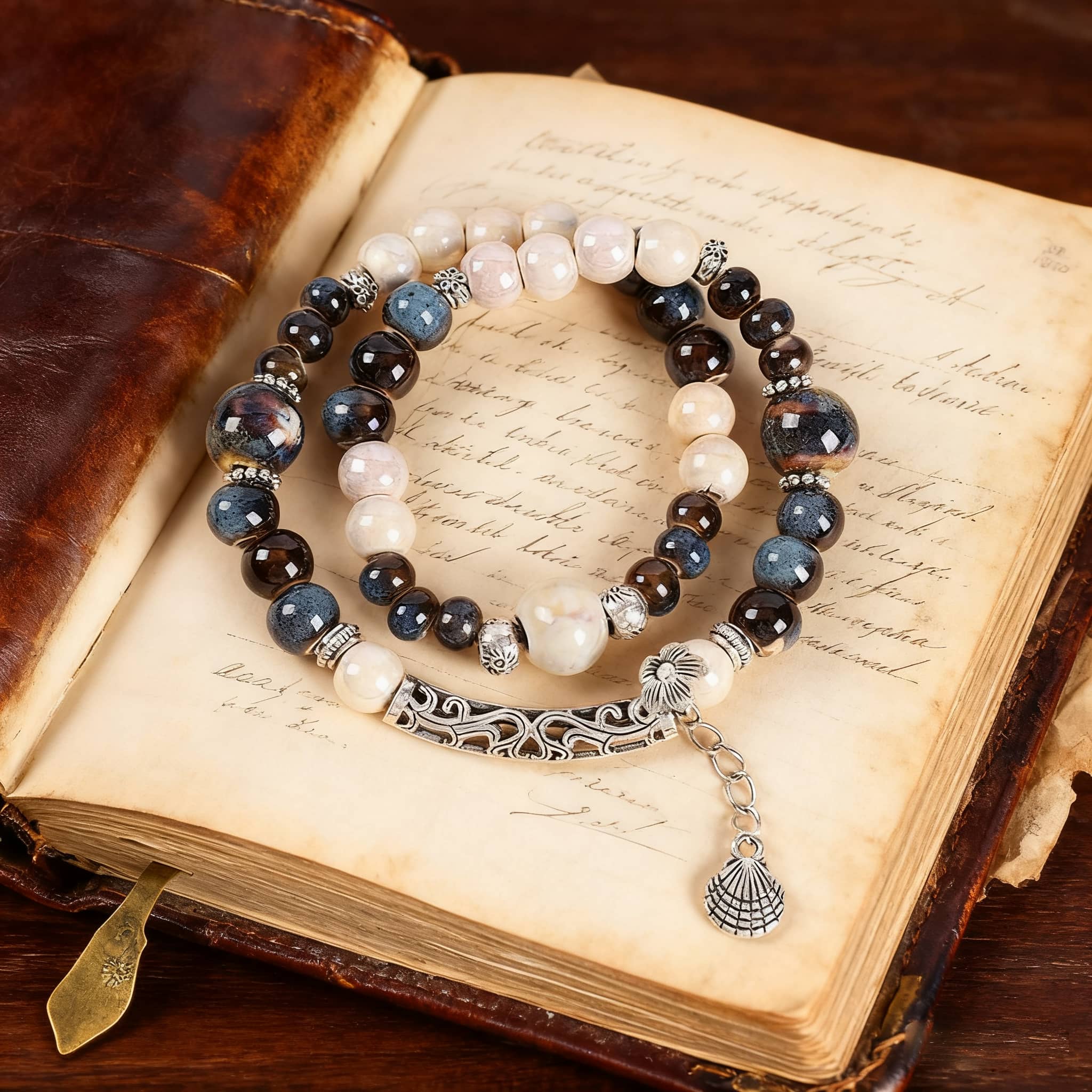 Ceramic and shell bracelet for self-care featuring natural beads and a decorative charm