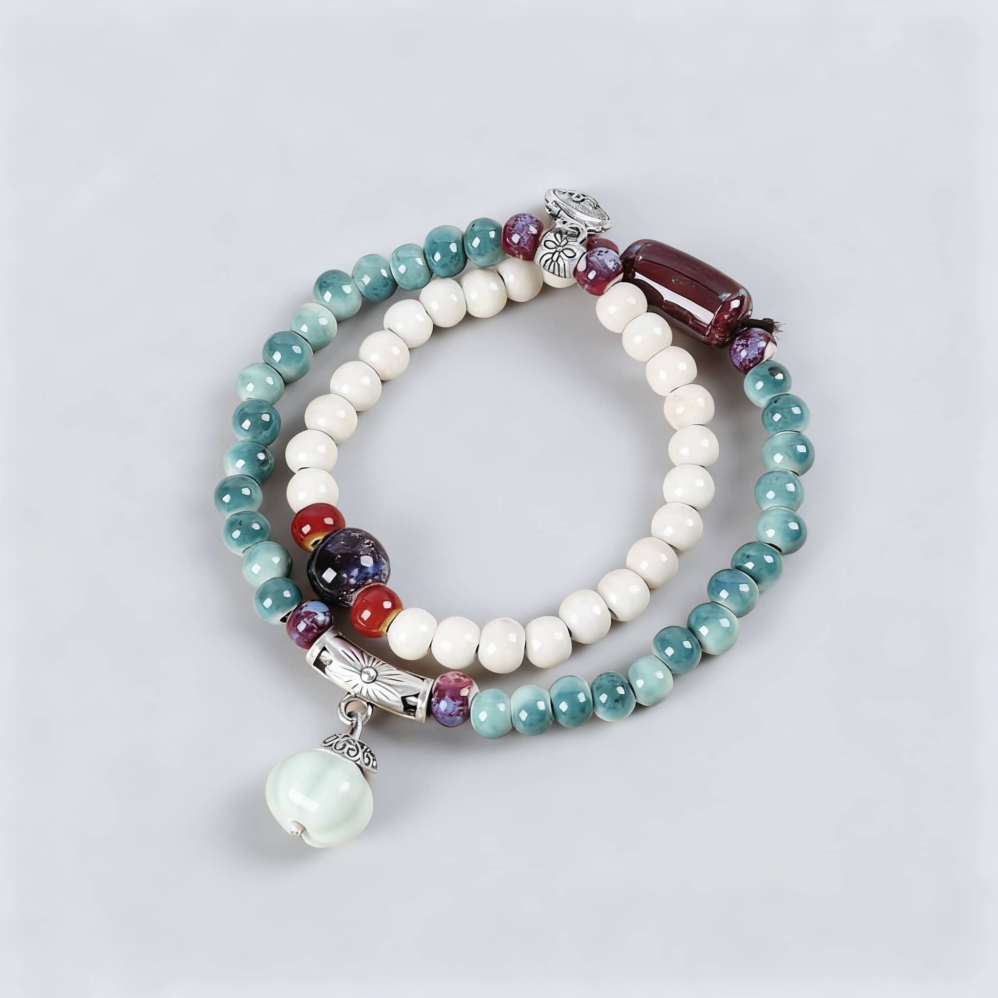 Colorful ceramic bead stacking bracelets featuring a mix of beads and silver accents for a stylish look