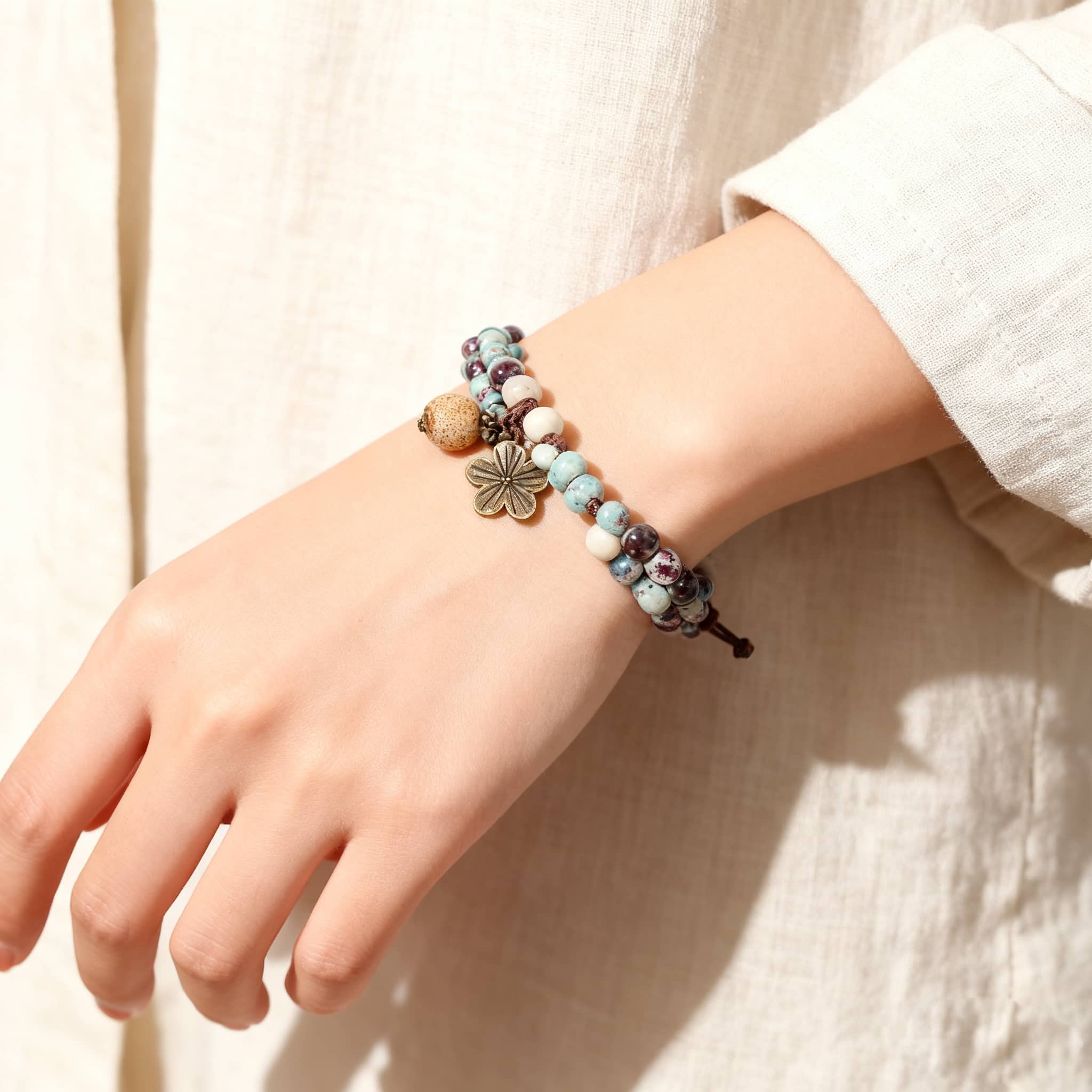 5 Senses ceramic floral charm bracelet featuring colorful beads and a stylish design for everyday wear