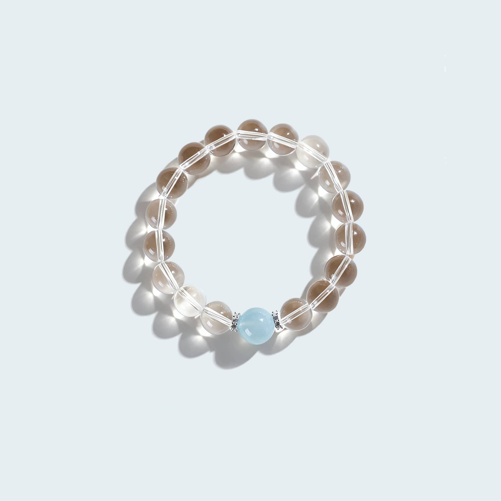 Anxious bracelet featuring clear quartz and aquamarine jewelry with soothing design for stress relief.