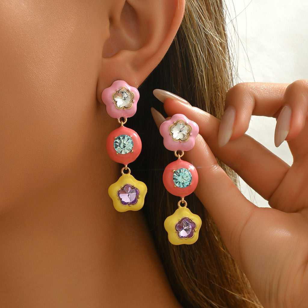 star shaped colorful earrings for women with dangling pink coral and yellow flower drops and crystal centers