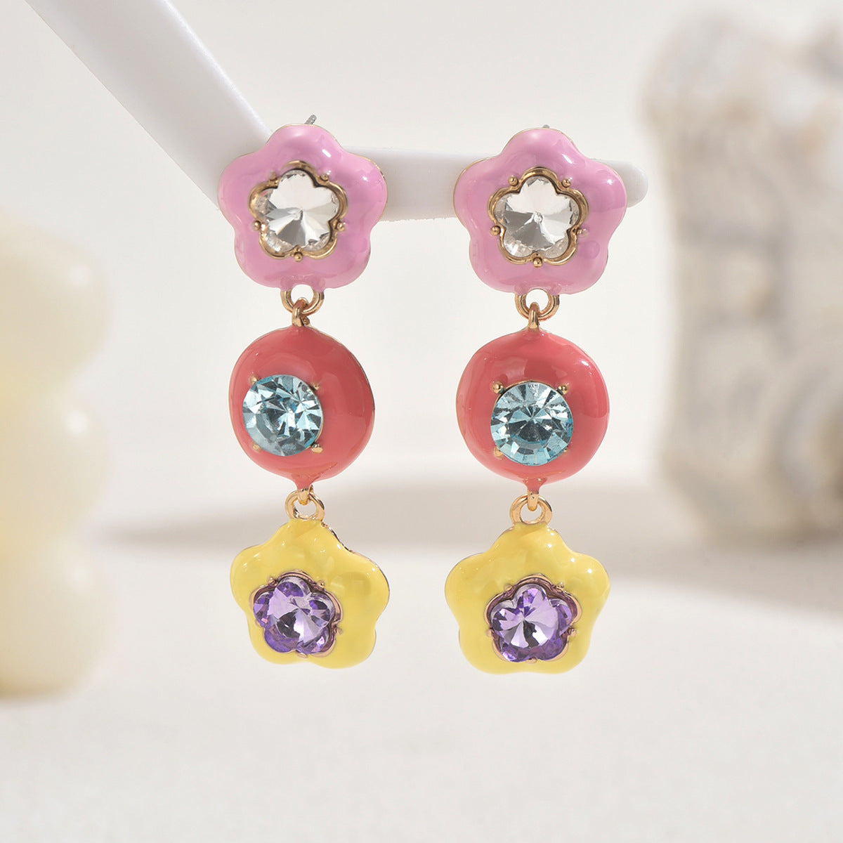 Pastel flower dangle earrings with blue and purple crystals playful star shaped colorful earrings for women