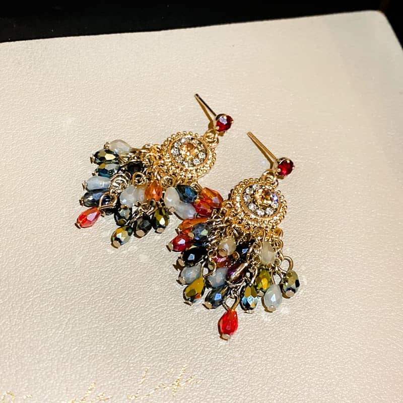 Anxious crystal fringe drop earrings with colorful beads and gold accents for a vibrant look