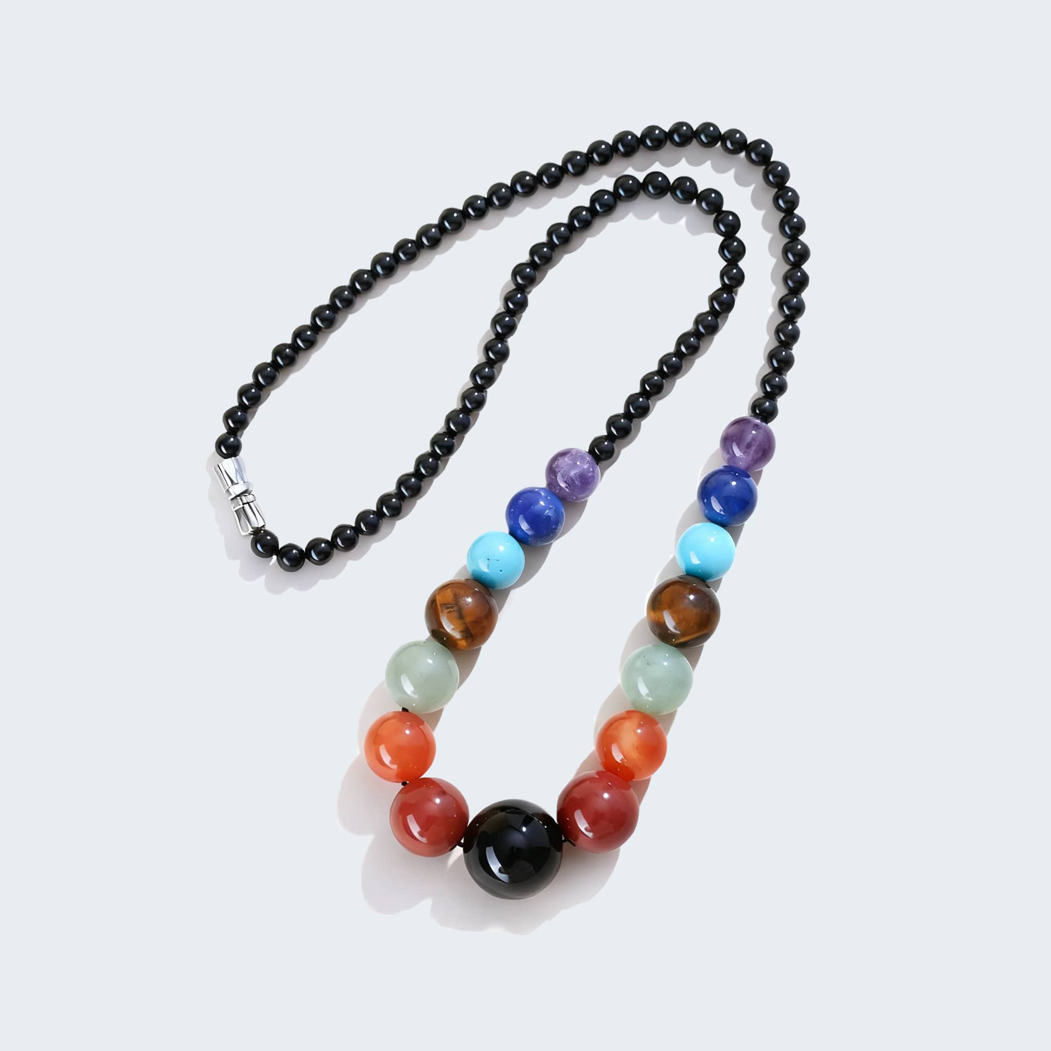 Colorful crystal necklace for stress and self care with various healing stones and black beads