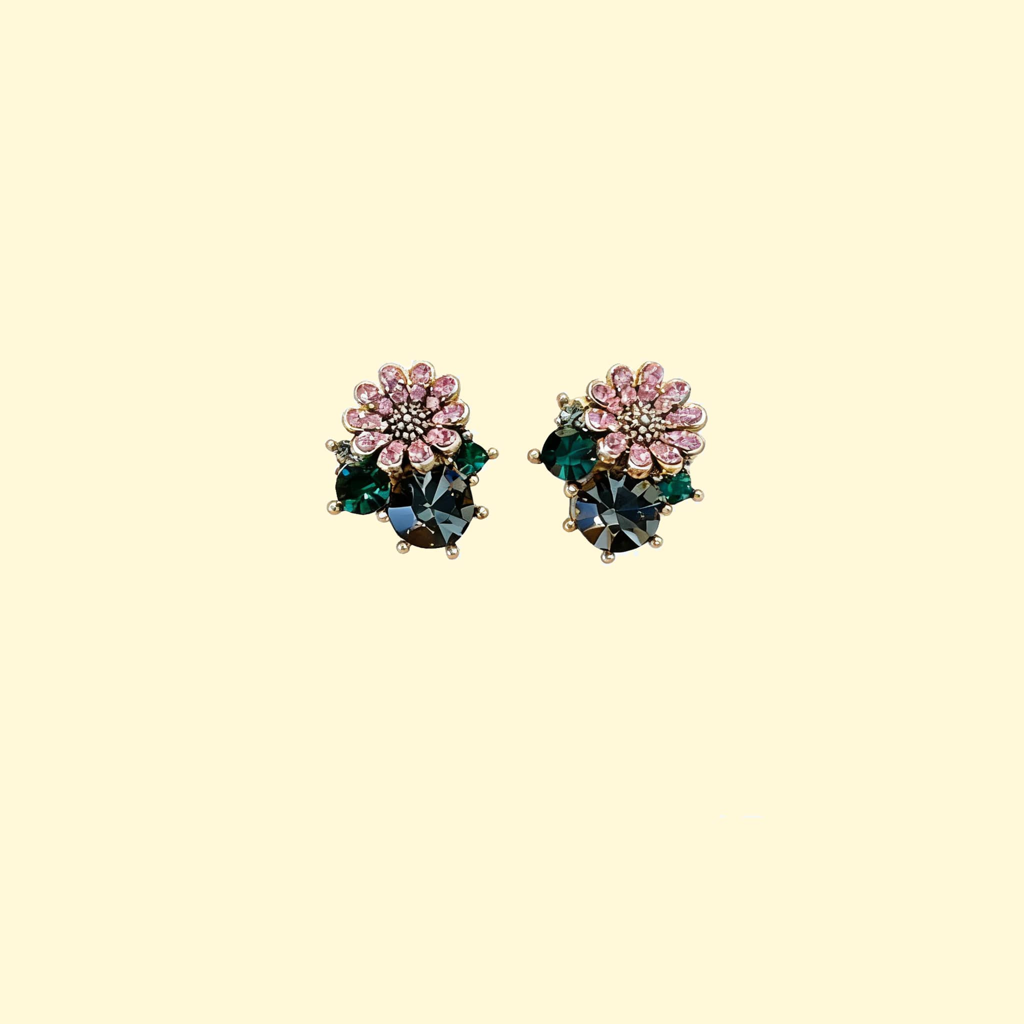 Daisy zircon stud earrings featuring vibrant pink and green stones for a floral-inspired look