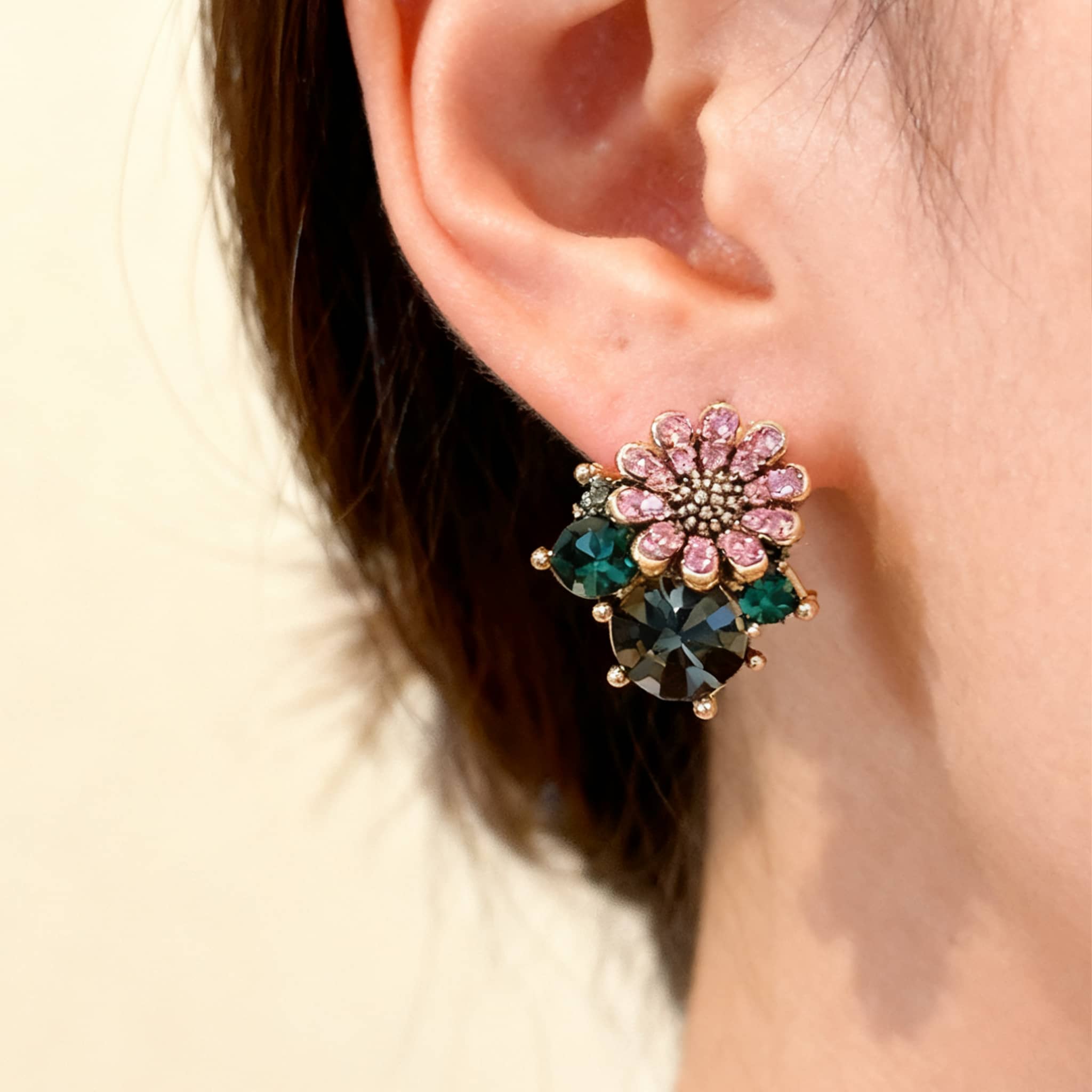 Daisy zircon stud earrings featuring vibrant pink and green stones for a cheerful look