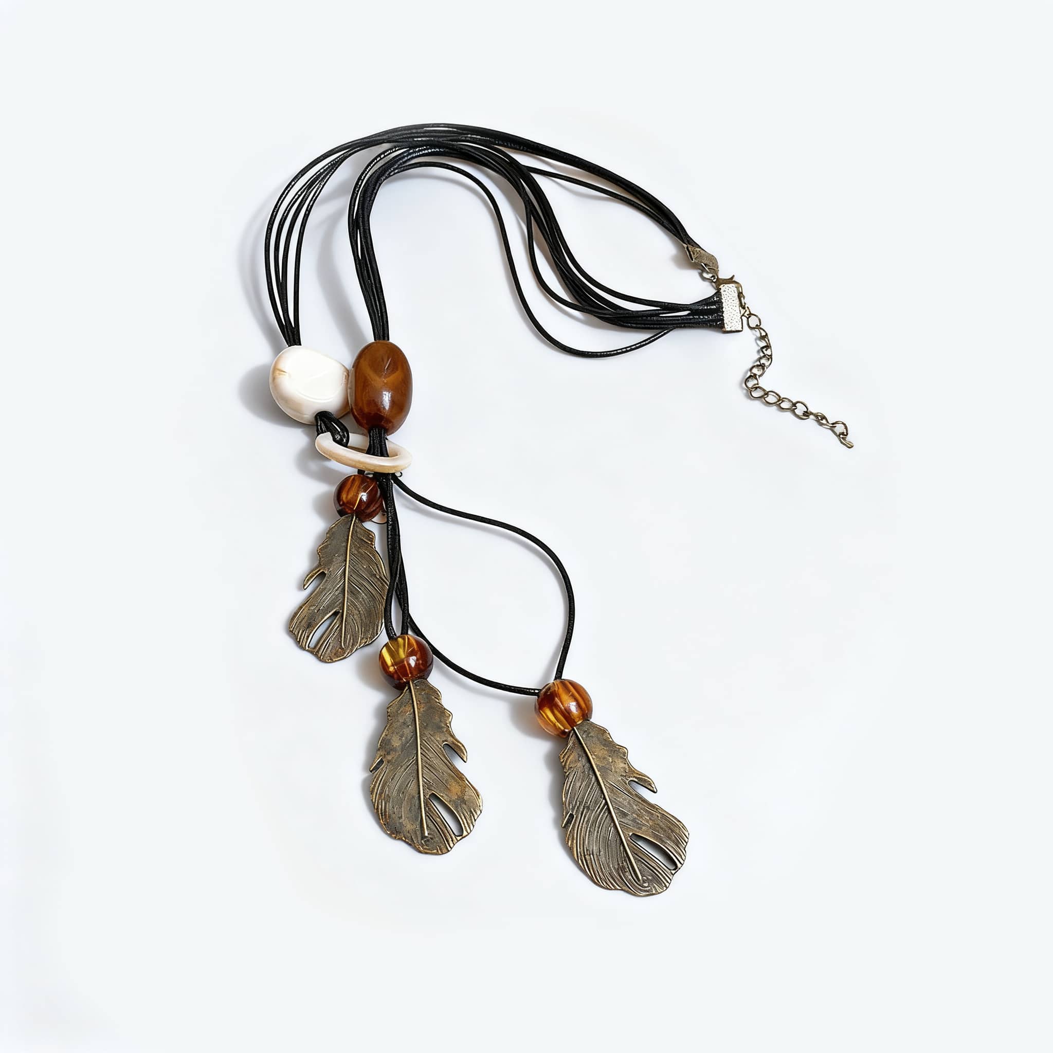 Angry earth pendant necklace with feather charms and mixed beads on a multi-strand cord