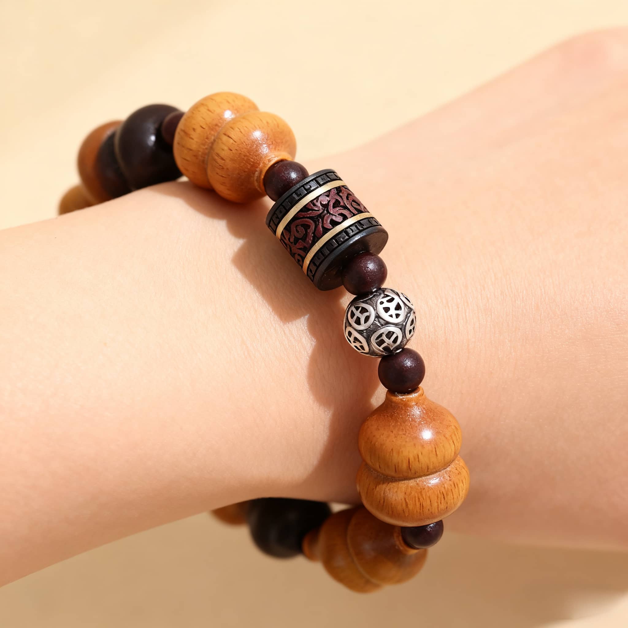 Calm bracelet by 5 Senses featuring wooden beads for emotional balance wrist accessory