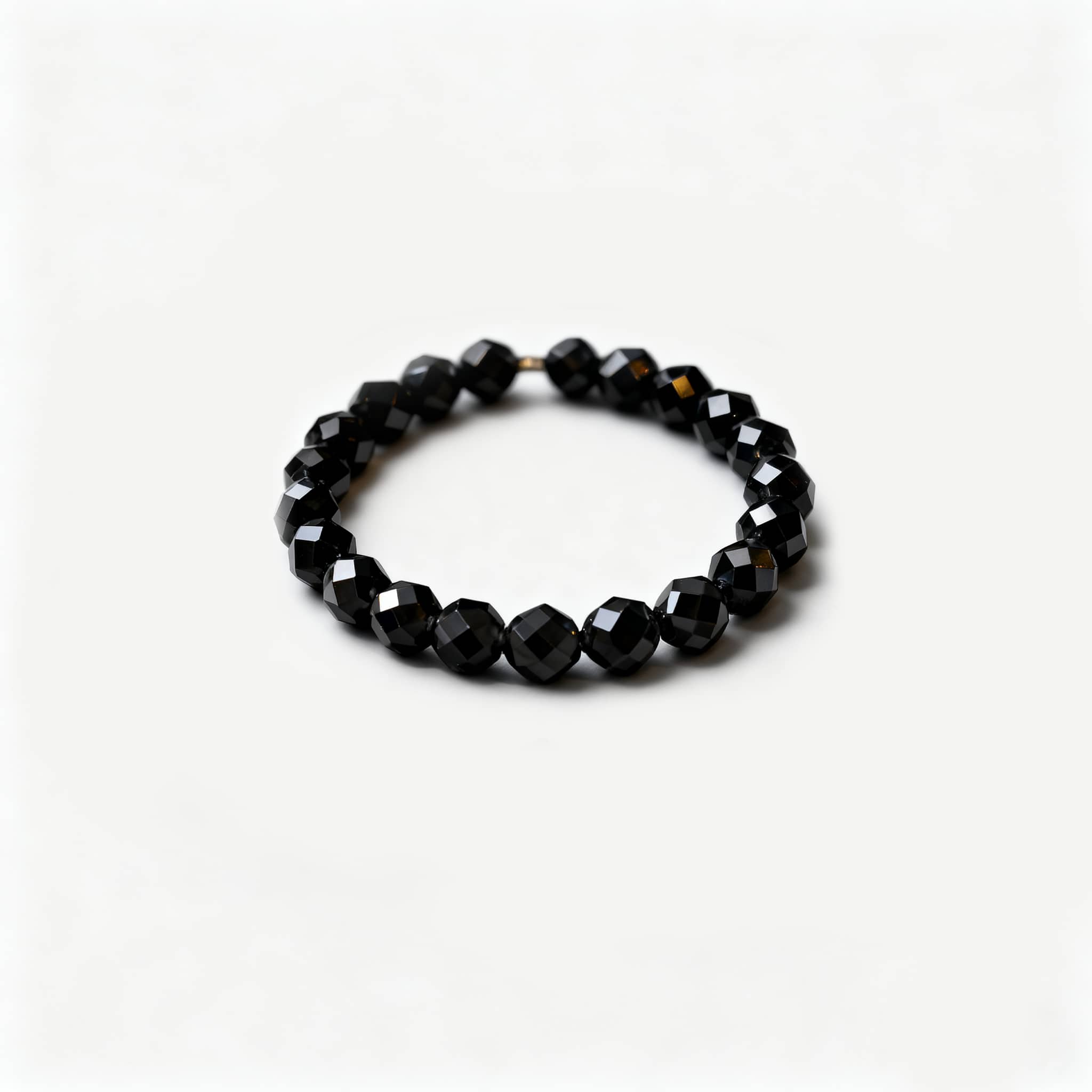 Anxious emotional support gemstone ring featuring faceted black beads for calming energy